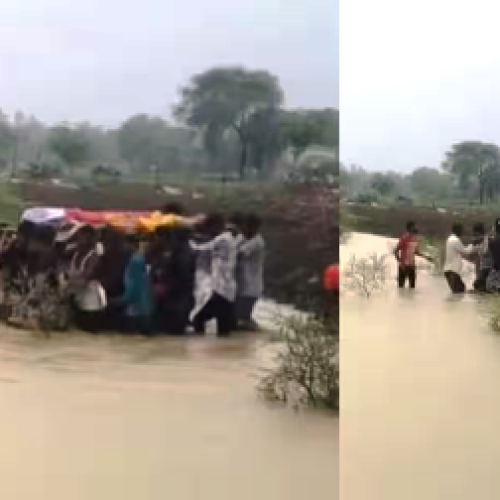 कमर तक पानी में कंधों पर शव ले जाने को मजबूर ग्रामीण, Video वायरल…